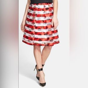 Pink Tartan, size 8, super fun red and white party skirt with lip pattern.